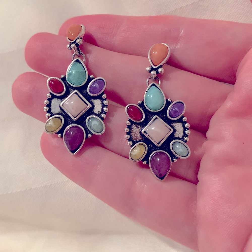 New, never worn silver tone earrings with multicolored cabochon accents.